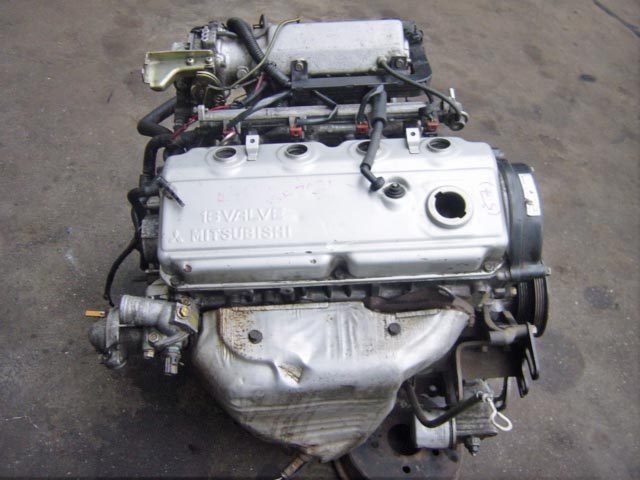 Мицубиси 4g64. Двигатель Митсубиси 4g64s4m. Mitsubishi 4g64. 4g64 двигатель Mitsubishi Chariot. ДВС 4g69.